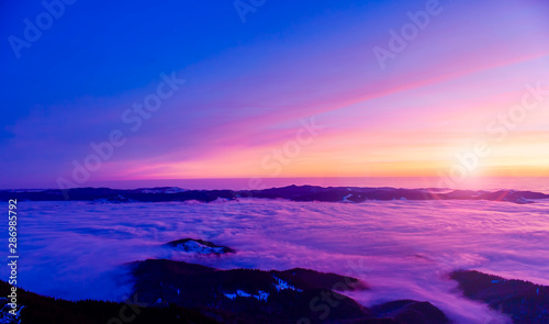 beautiful sunset or sunrise above the clouds. Romania