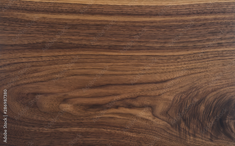 Texture of black walnut board with oil finish Texture of black walnut board with oil finish