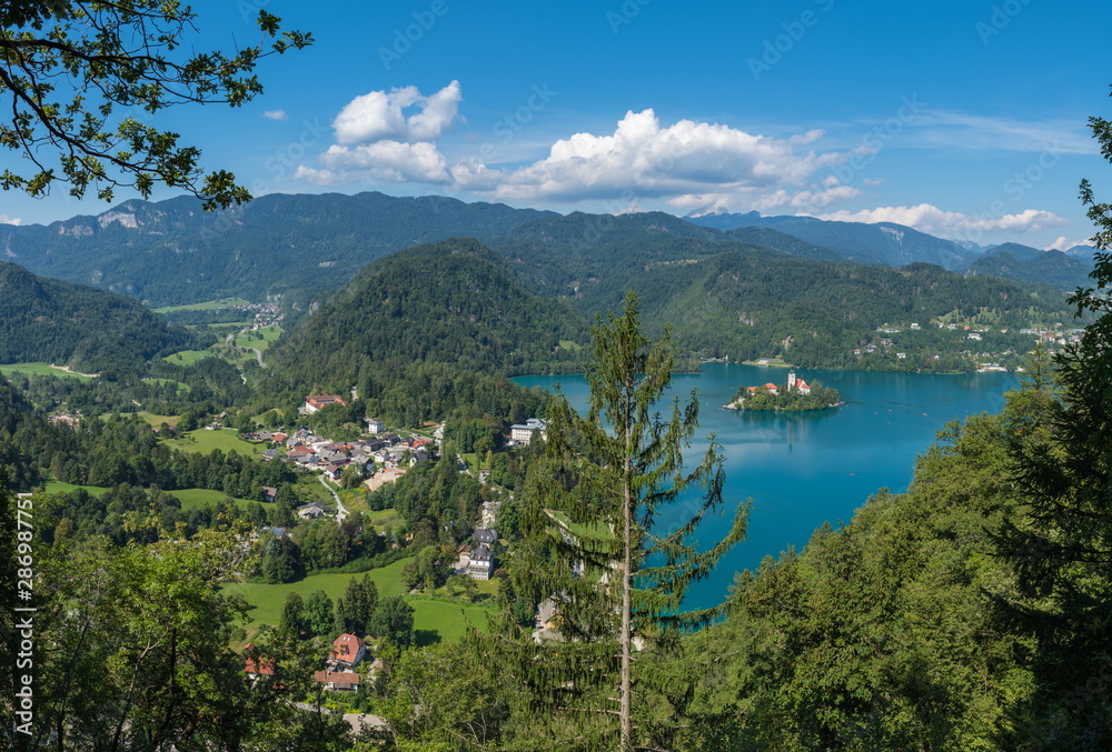 The picturesque panoramic landscape of the western part of Lake Bled (from Straza mountain).