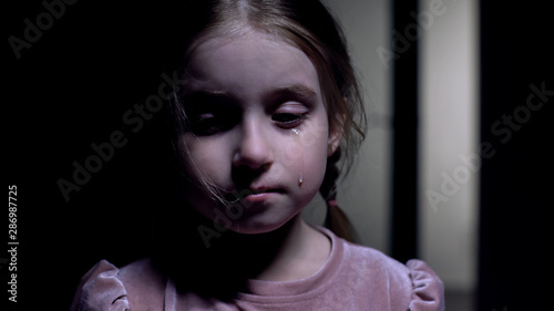 Quadro su tela Little kidnapping victim crying on camera, child abuse, domestic violence result