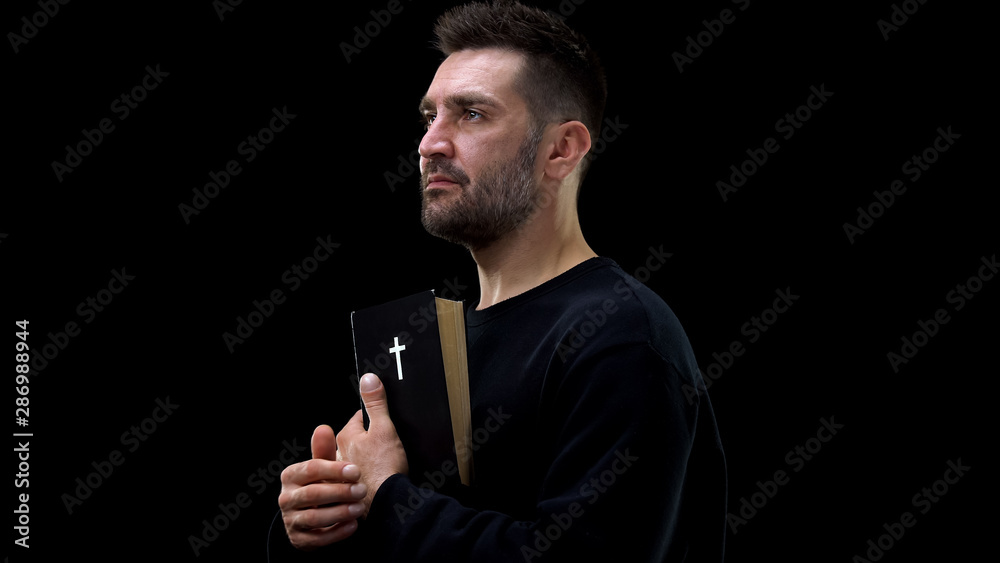 Male holding bible, religious hope, christian belief, spiritual support, faith Male holding bible, religious hope, christian belief, spiritual support, faith
