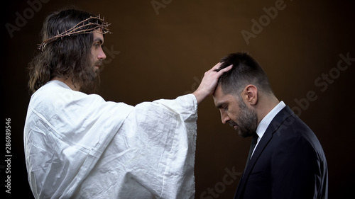 Photography Savior putting hand on male head, spiritual guide, religious love, helping God