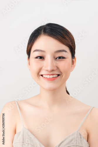 Close up of young Asian beautiful woman with smiley face.