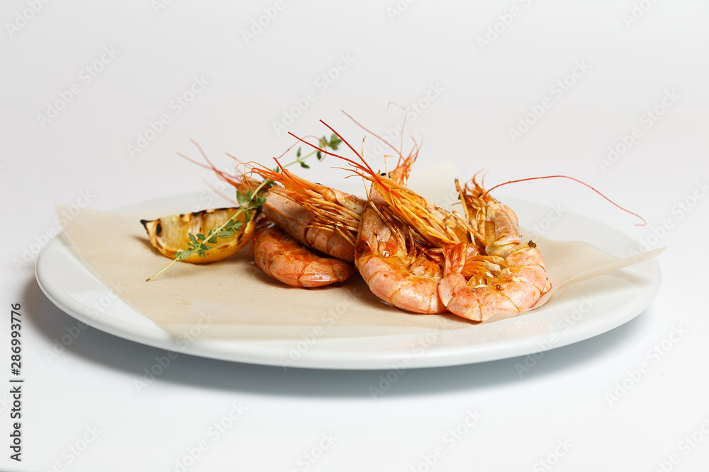 fried prawns or shrimps on a white background fried prawns or shrimps on a white background