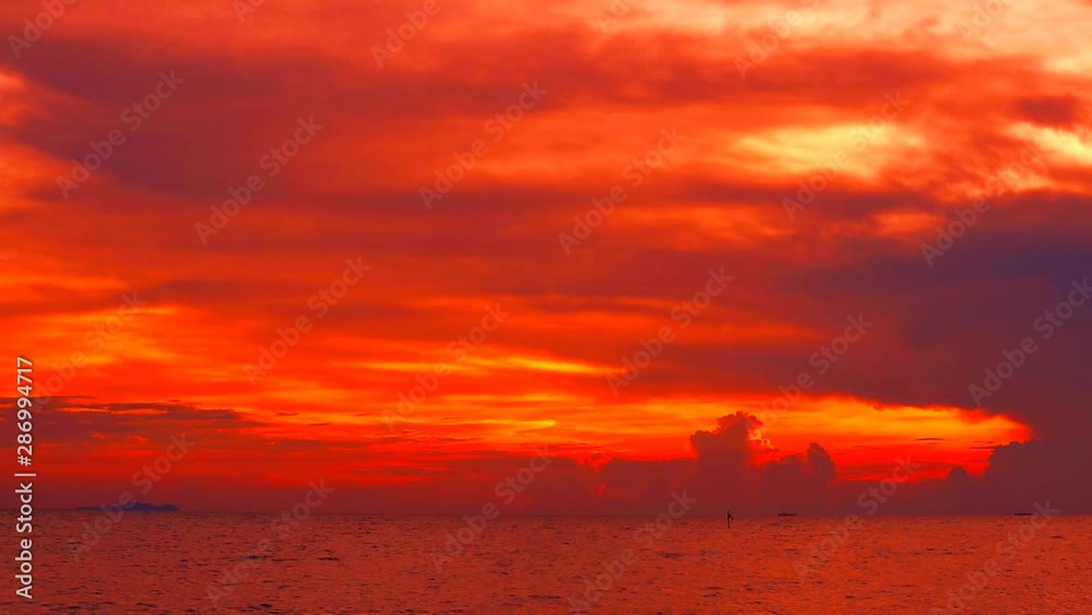 red sunset red dark red sky and cloud moving on sea red sunset red dark red sky and cloud moving on sea