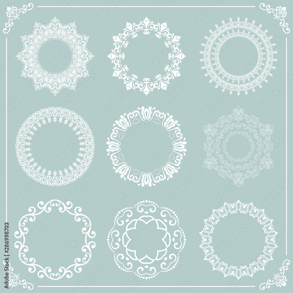 Vintage set of vector round elements. Different elements for design frames, cards, backgrounds and monograms. Classic patterns. Set of vintage round white patterns