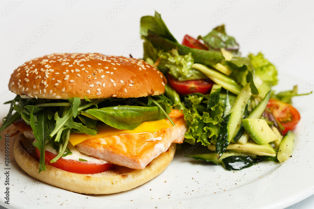 burger with salmon and vegetables