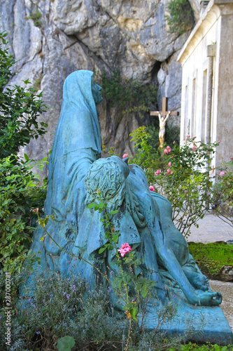 France, Sainte-Baume, august 23, 2019 : Statue of Mary Magdalene in front of the grotto entrance.