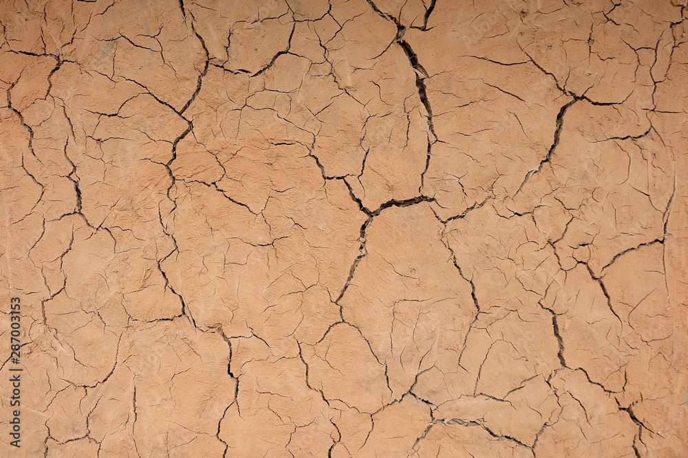 Dry cracked earth, texture and crack on clay wall, Dry mud. Dry cracked earth, texture and crack on clay wall, Dry mud.