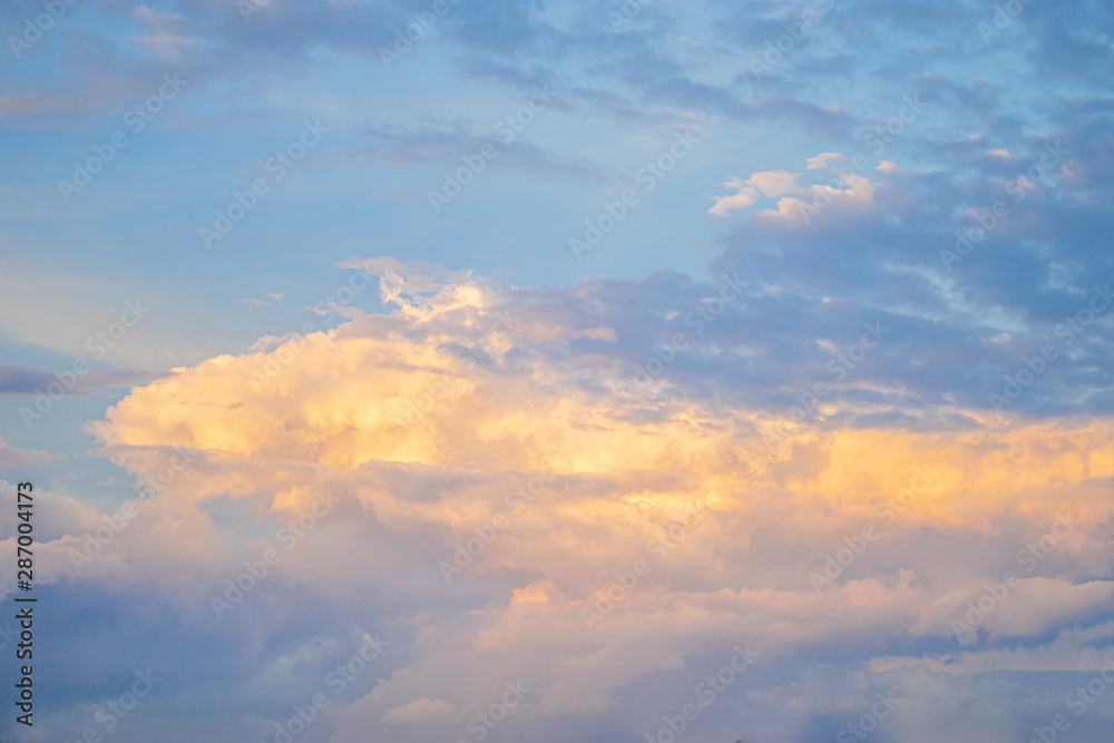 beautiful blue and golden sky in evening. .Cloudy blue and golden sky in sunrise. Scenic clouds gold sky in sunset. beautiful blue and golden sky in evening. .Cloudy blue and golden sky in sunrise. Scenic clouds gold sky in sunset.