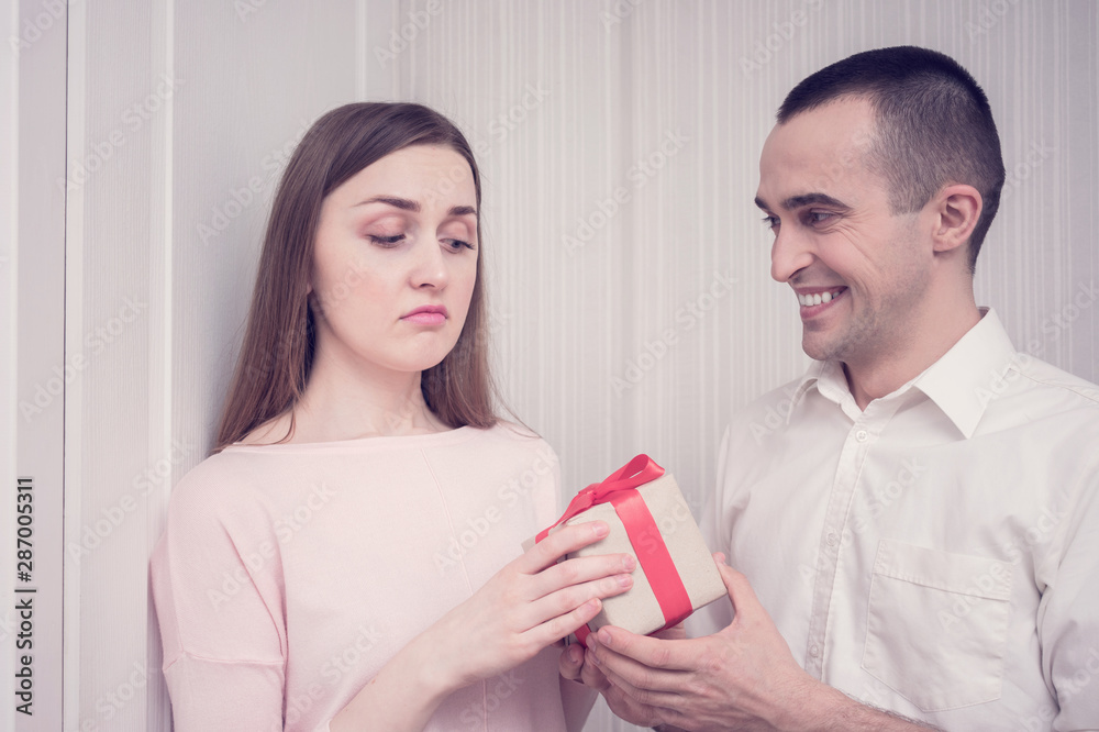 Boyfriend gives a gift to his capricious girl, toned Boyfriend gives a gift to his capricious girl, toned
