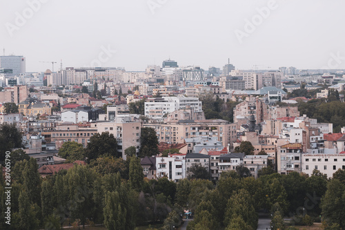 Cityscape of old part of Bucharest, with many worn out buildings, as seen from the Palace of Parliament