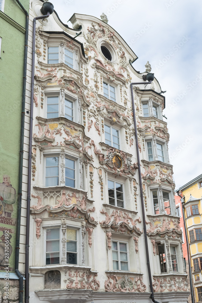 Fototapeta premium Vertical view of historic architecture at the town square in the old part of the city of Innsbruck, Austria