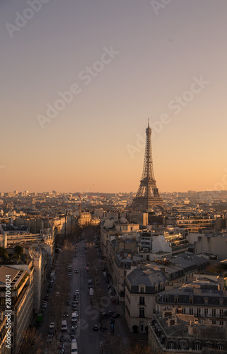 Eiffel Tower during sunset © Braeden