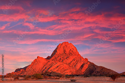 Spitzkoppe, beautiful hill in Namibia. Rock monument in the nature. Landscape in namibia. Stone in the nature, evening light in the rocky desert. Travel in Namibia, Africa. Große Spitzkoppe monument.