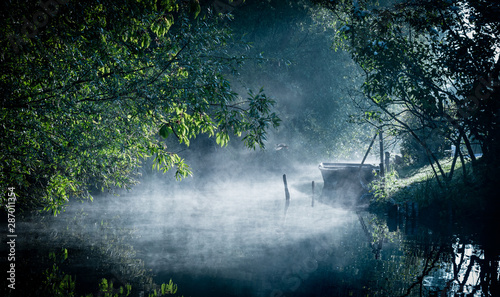 Mist on the river at dawn in the marshes in Bourges city