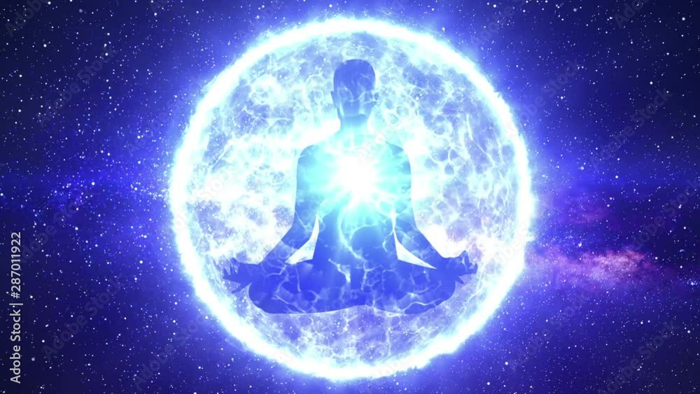 Silhouette of man doing yoga meditation enveloped in a sphere of energy or aura light with the heart chakra illuminated. Concept of zen spirituality. Spiritual connection. Starry space background