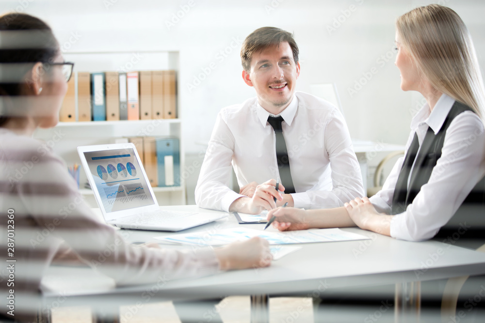 Businessman tells his colleagues about a new project Businessman tells his colleagues about a new project