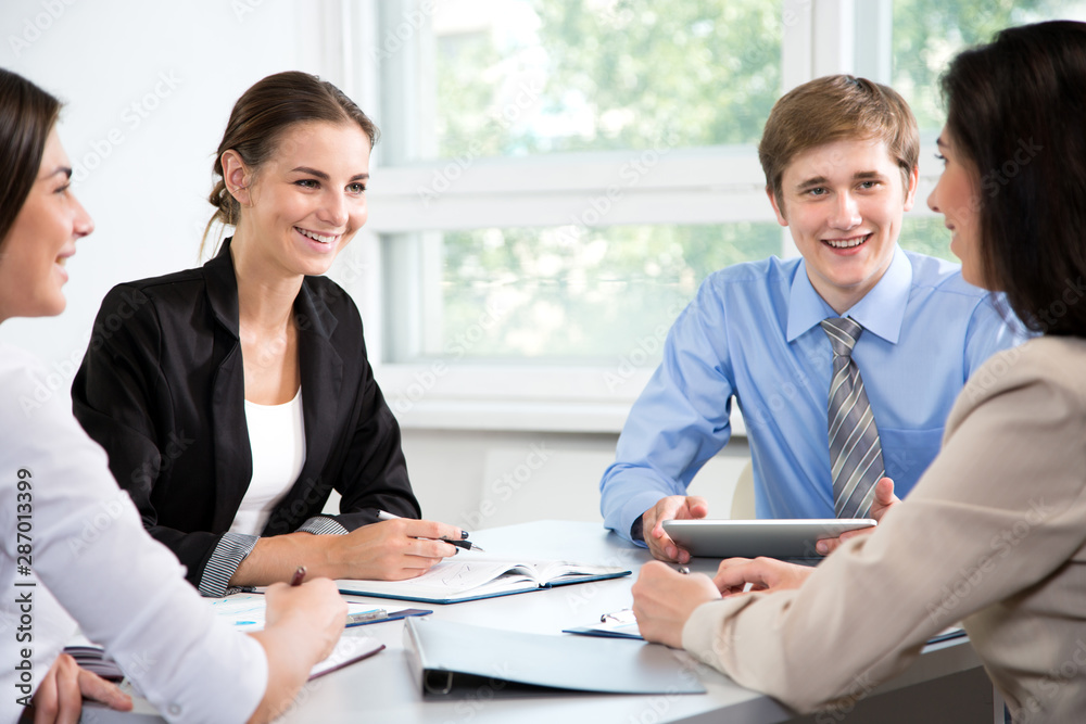 Businesspeople discuss a new project Businesspeople discuss a new project