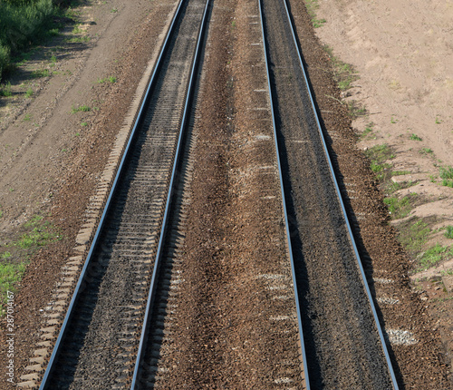 long railroad tracks, close up. top view