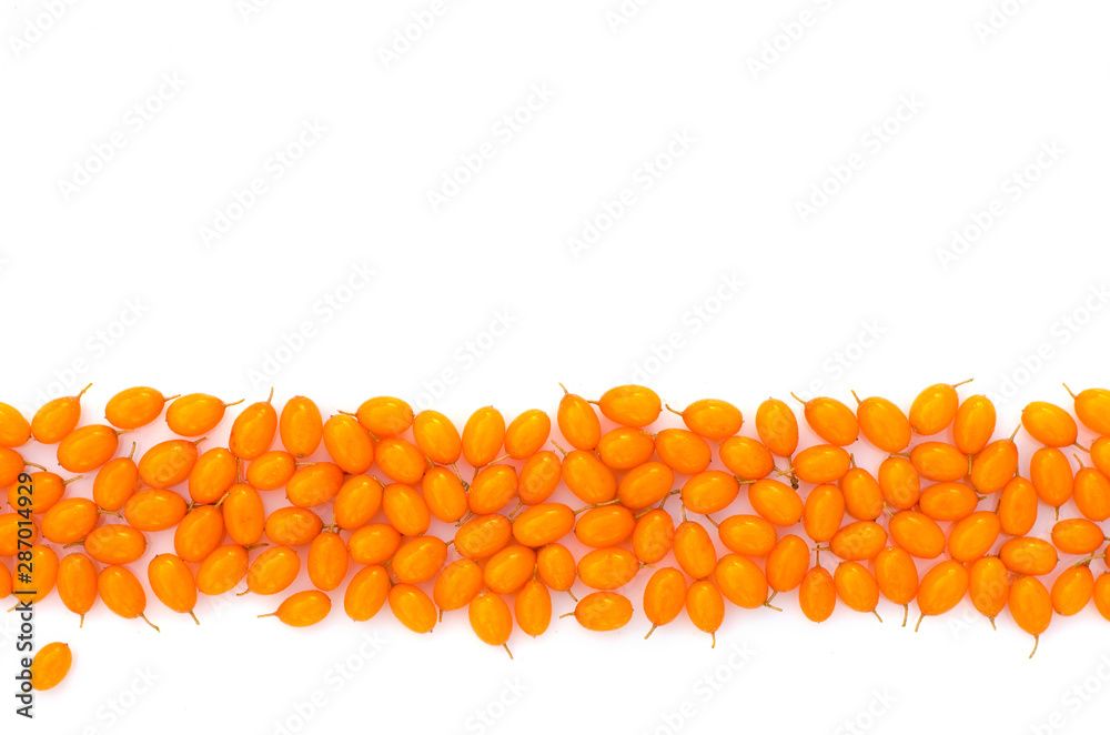 Sea buckthorn berries on a white background. Composition of berries. Strip. Sea buckthorn berries on a white background. Composition of berries. Strip.