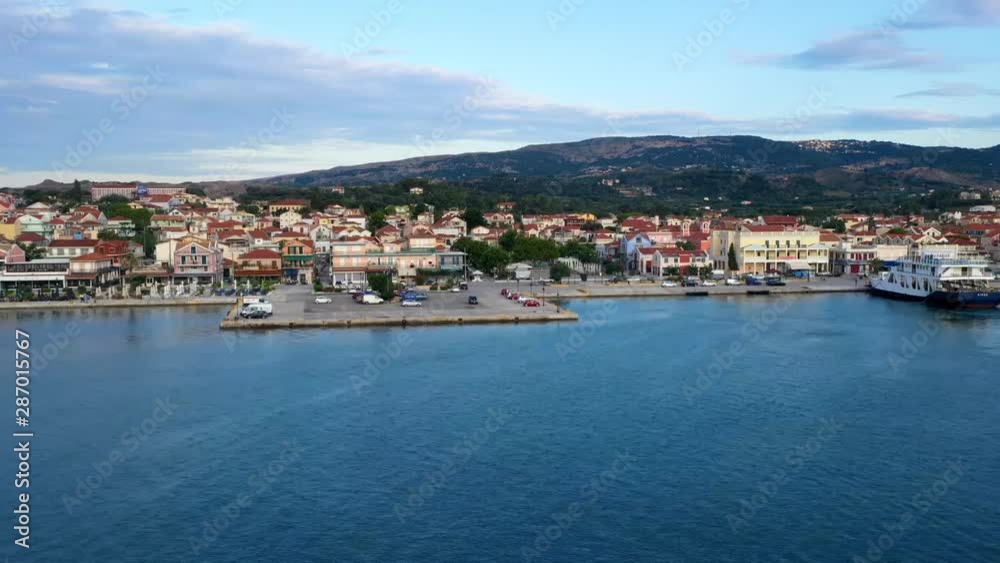 Lixouri town shoreline with nautical boats cruising, time lapse shot Lixouri town shoreline with nautical boats cruising, time lapse shot