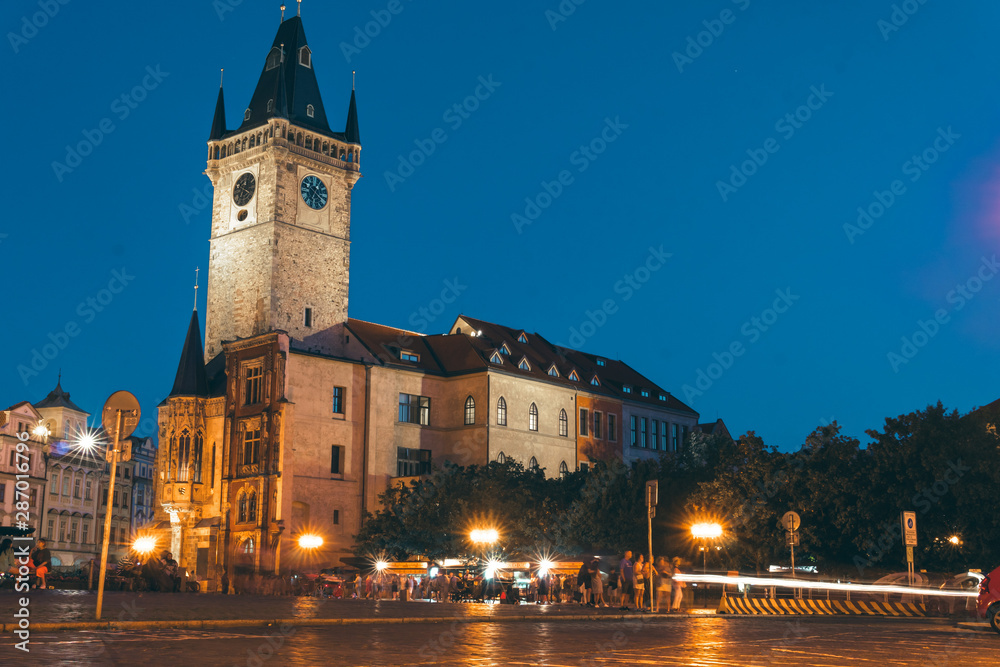 the main square, on the street of the old city of Prague, night time. historical center. travel and tour in Europe, tourism. Praha, vertical photo, copy space