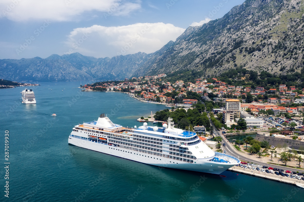 Montenegro. Aerial view at the cruise ship Adventure and travel.  Landscape with cruise liner on Adriatic sea. Luxury cruise. Travel - image