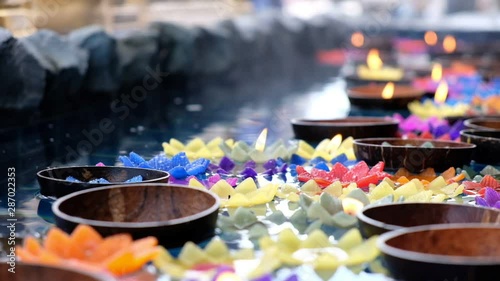 Flower candle in basin, Buddhism for blessings