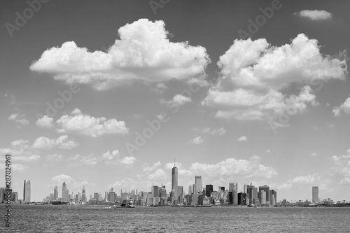 Scenic cloudscape over Manhattan on a sunny day, New York City, USA.