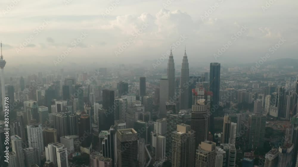 Aerial drone view of Kuala Lumpur city skyline during cloudy day Aerial drone view of Kuala Lumpur city skyline during cloudy day