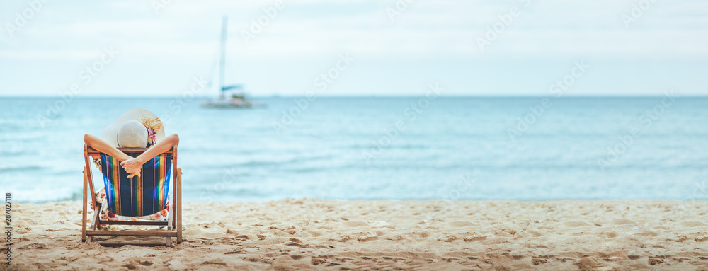Woman on beach in summer