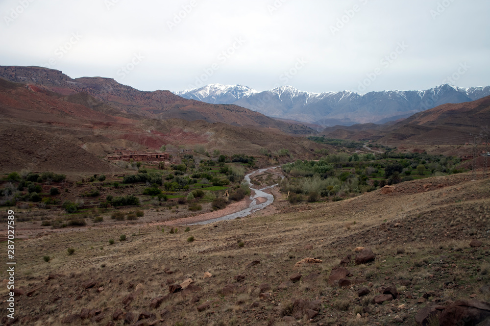 Φωτογραφία High Atlas Mountains Morocco, isolated village on the way to Ouarzazate, with sn