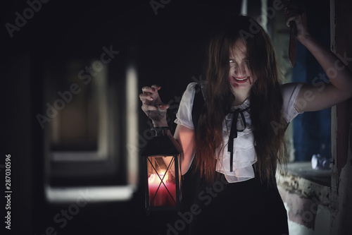 Girl from horror movie with knife