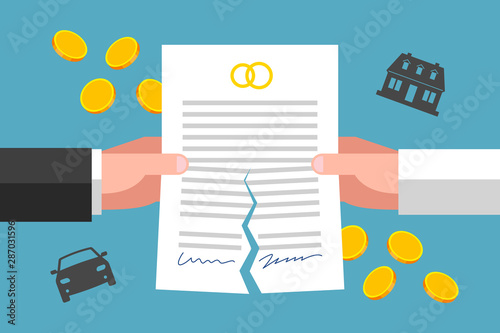 Hands are tearing prenuptial agreement