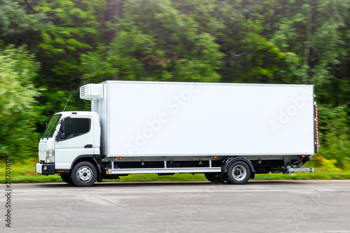 White refrigerator truck, delivery cargo van, thermo delivery photo