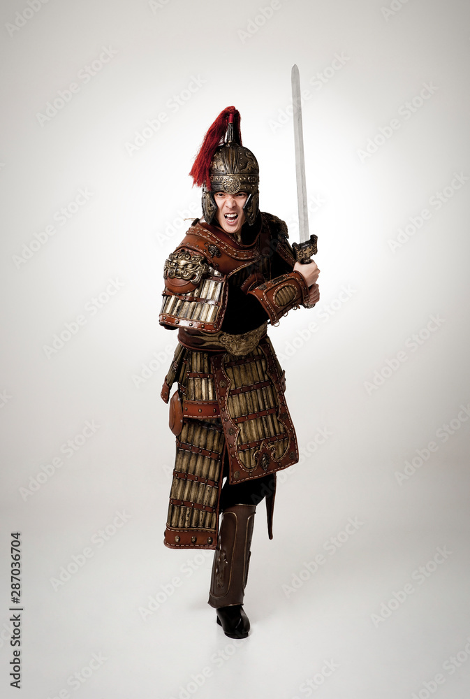 Fototapeta premium Adult male wearing very old armor.