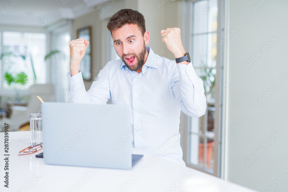 Business man eating take away asian noodles food while working using computer laptop and smiling Business man eating take away asian noodles food while working using computer laptop and smiling