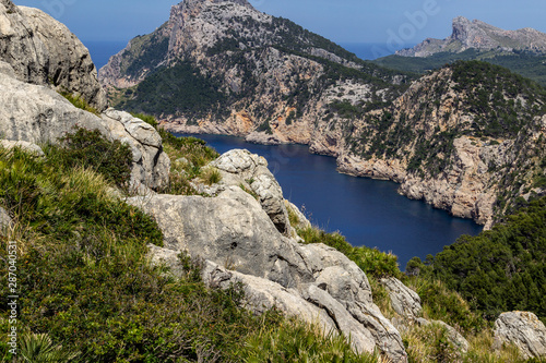 Scenic view at the coastline of Formentor, Punto de la Salada on balearic island Mallorca, Spain with clear blue water and rock formation