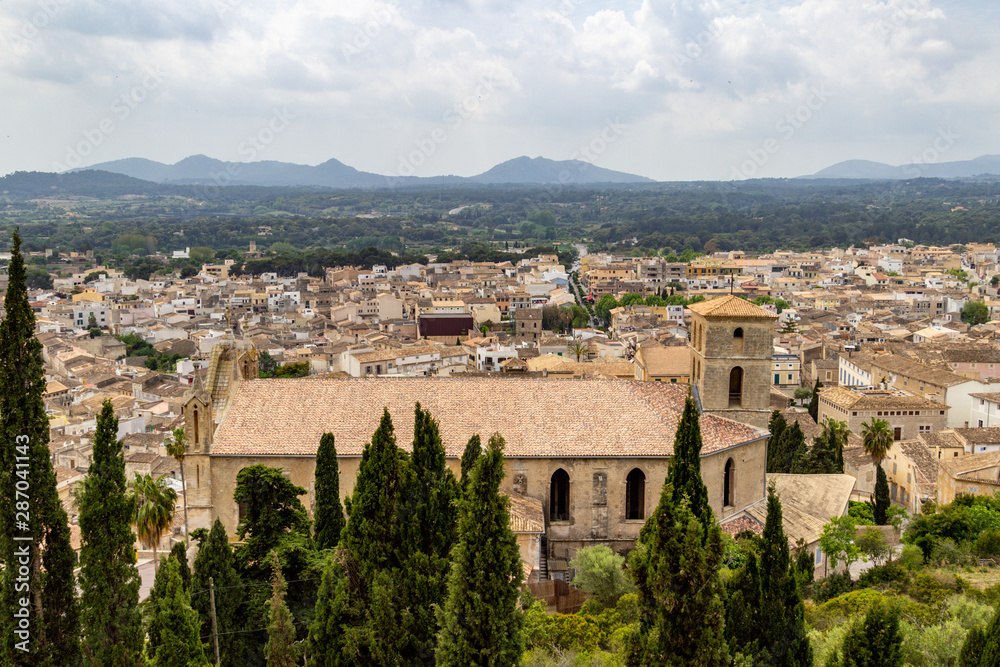 Obraz premium Panoramic view from castle San Salvador over the city of Arta at the east coast of balearic island Mallorca, Spain