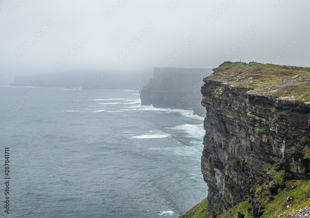 Stormy day at Cliffs of Moher in Ireland Stormy day at Cliffs of Moher in Ireland