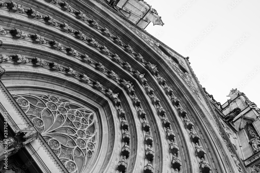 Black and white photo of the fragment of arch. The Cathedral of the Holy Cross and Saint Eulalia. Barcelona, Spain