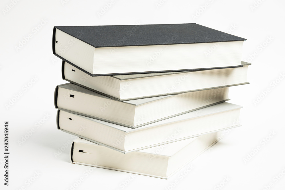 A Disarrayed Stack OF Cloth Bound Books A Disarrayed Stack OF Cloth Bound Books