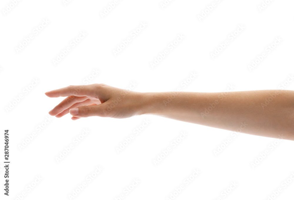 Young woman holding her hand on white background, closeup