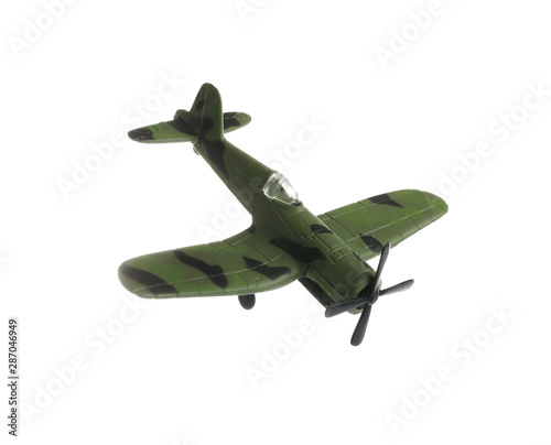 Vintage toy military airplane on white background