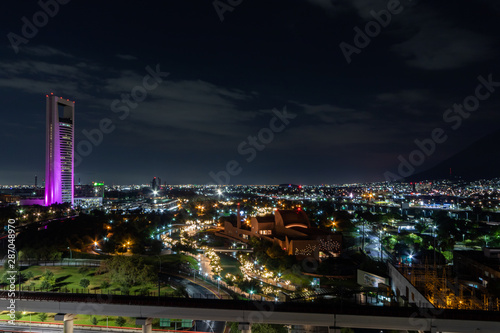 MONTERREY, NUEVO LEON / MEXICO - July 12, 2019: A night shot of the river walk and Mexican Baseball Hall of Fame building next to the river walk in La Fundidora Park in Monterrey.