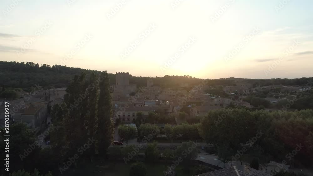 Sunset flying at Spanish town - Peratallada, Catalonia Sunset flying at Spanish town - Peratallada, Catalonia