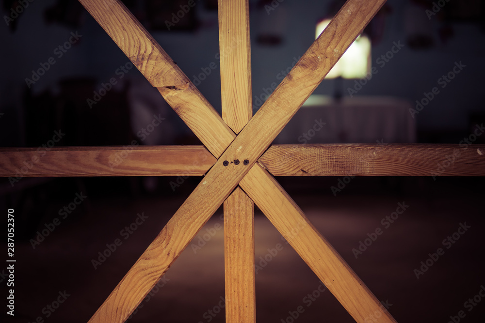 wooden barrier in front of a room