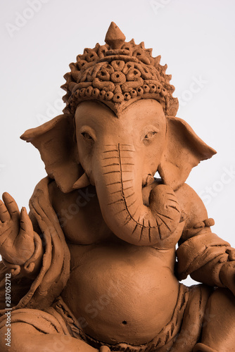 eco friendly Ganesh/Ganpati idol or murti, home made. selective focus