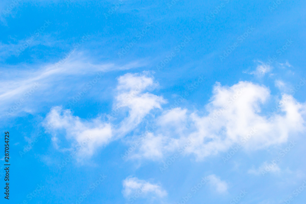 The white clouds in the sky in the afternoon.